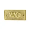 WC-skylt - Mässing