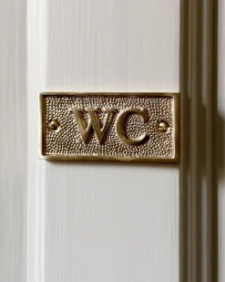 WC-skylt - Mässing